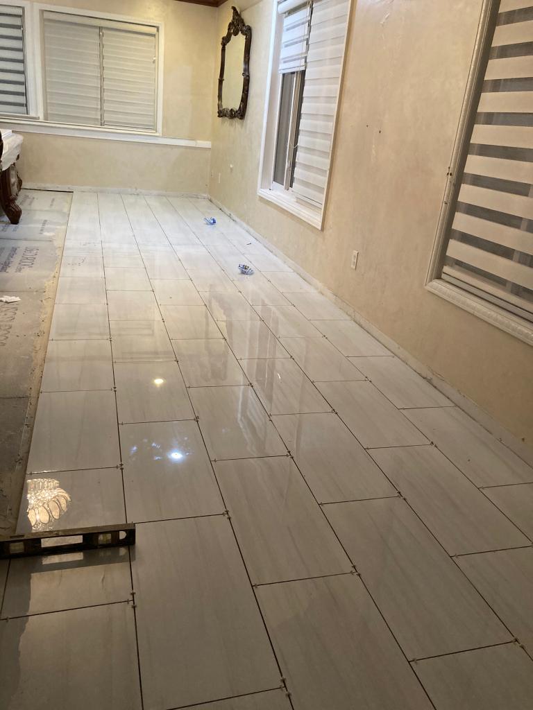 Large finished tile floor by JR Citywide Construction